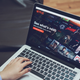 Stock image of laptop screen displaying Netflix homepage.